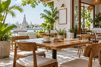 Indy Massage Chiang Mai: Chiang Mai cafes guide hero, bright cafe terrace with wooden tables and green plants
