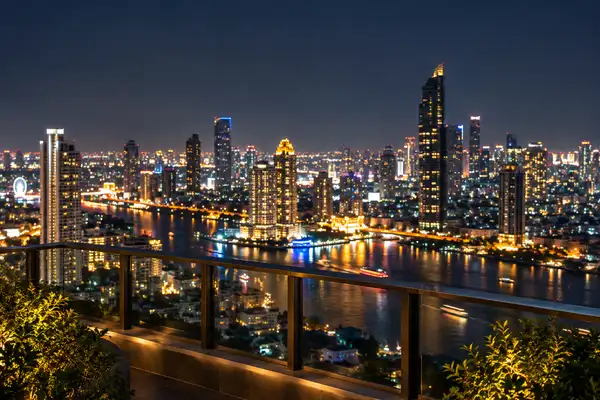 Indy Massage Chiang Mai: Chiang Mai city lights seen from a rooftop at night with soft bokeh