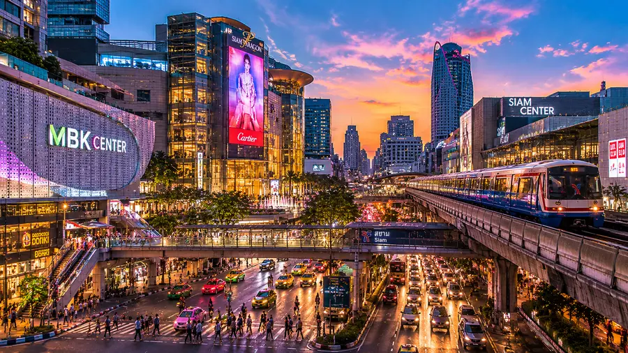 In room massage near Park Hyatt Bangkok, with MBK Center, the Siam area and the BTS Skytrain at dusk | Indy Massage Bangkok
