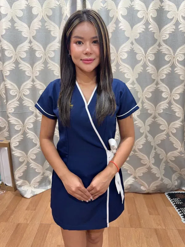 Indy Massage Bangkok outcall massage therapist Nilin in uniform